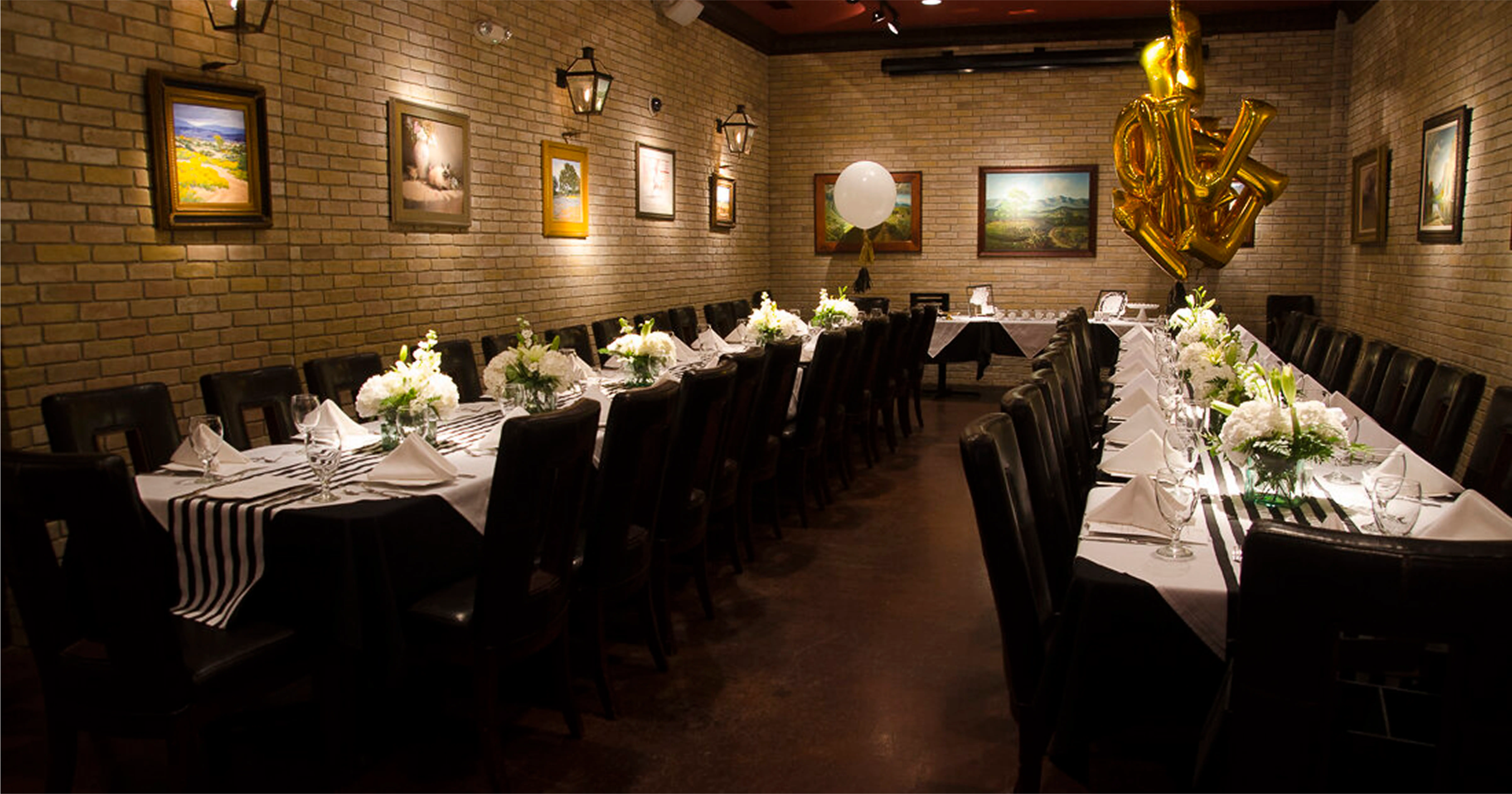 Elegant private dining room at The Patio on Guerra in McAllen, featuring historic decor and fine dining ambiance.